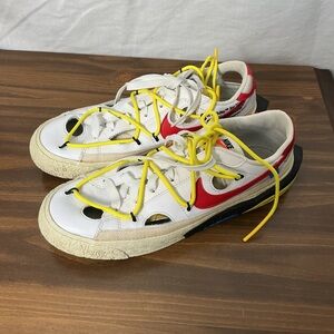 Nike White Sneakers with Red and Yellow Accents